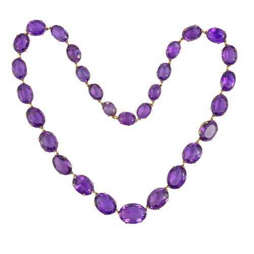 Late 19th century graduated amethyst necklace, c.1890, with twenty-nine oval facetted amethyst,